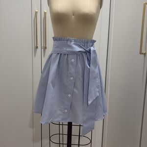 Light blue and white pinstripe mini length skirt.
